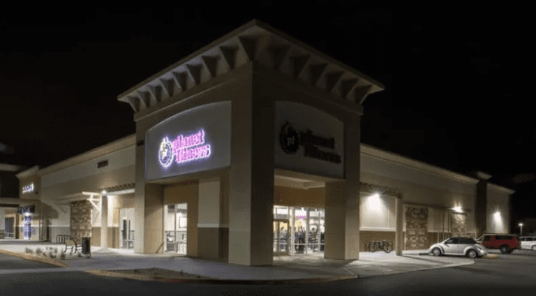 Donut shop storefront at night